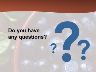 A Bowl Of Blueberries On A Table With Leaves PowerPoint Template