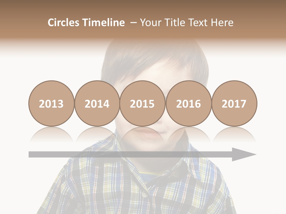 A Young Boy Is Smiling For The Camera PowerPoint Template