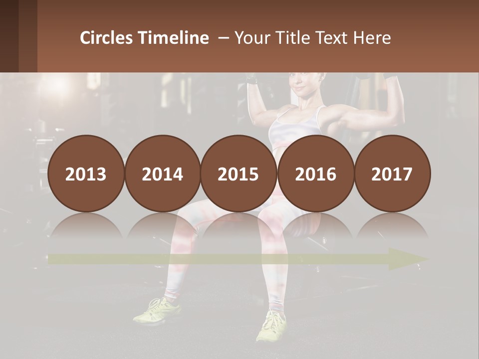 A Woman Is Doing Exercises With Dumbbells In A Gym PowerPoint Template