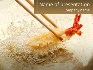 Chopsticks Are Being Used To Stir Food In A Pan PowerPoint Template