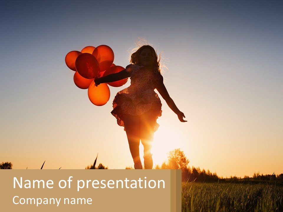 A Woman Holding Balloons In The Air At Sunset PowerPoint Template
