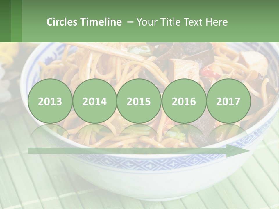 A Blue And White Bowl Filled With Noodles And Vegetables PowerPoint Template