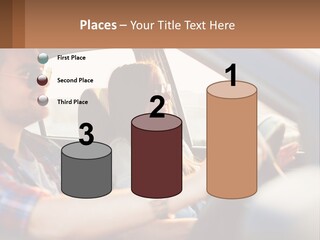 A Man And A Woman Sitting In A Car PowerPoint Template