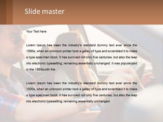 A Man And A Woman Sitting In A Car PowerPoint Template