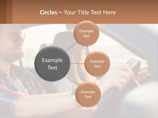 A Man And A Woman Sitting In A Car PowerPoint Template