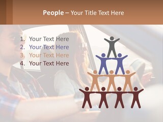 A Man And A Woman Sitting In A Car PowerPoint Template