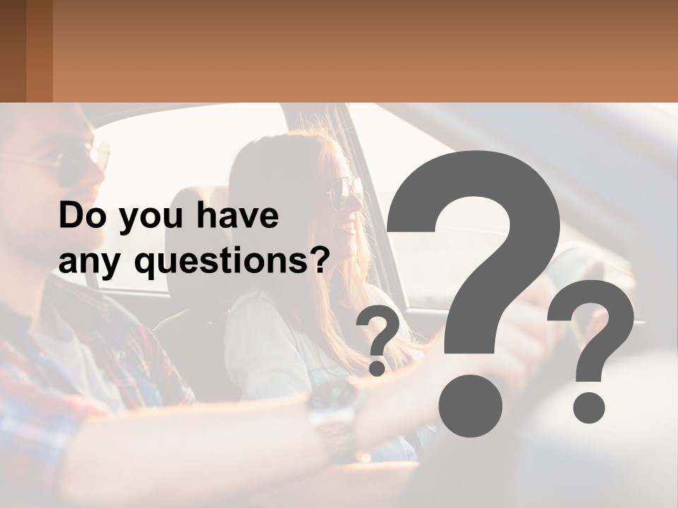 A Man And A Woman Sitting In A Car PowerPoint Template