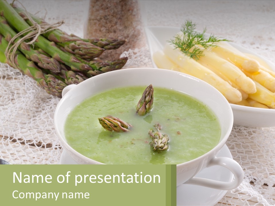 A Bowl Of Soup With Asparagus And Asparagus On The Side PowerPoint Template