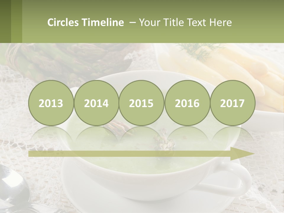 A Bowl Of Soup With Asparagus And Asparagus On The Side PowerPoint Template