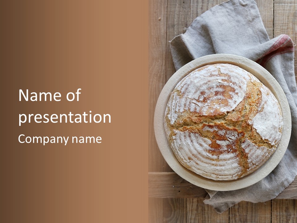 A Plate Of Bread On A Wooden Table PowerPoint Template