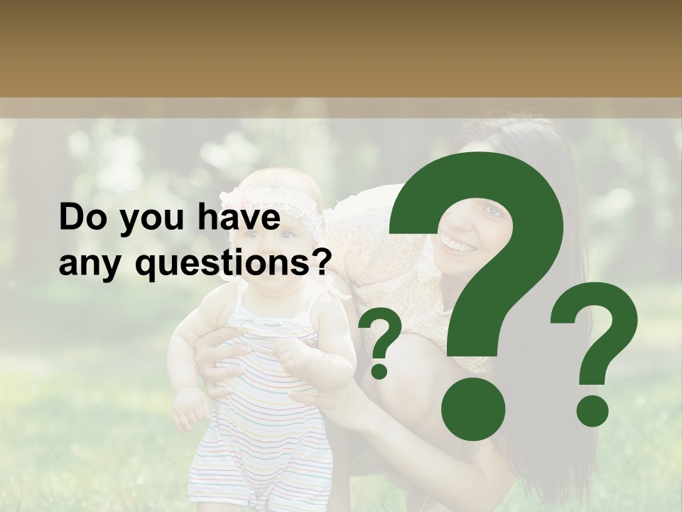A Woman Holding A Baby In Her Arms PowerPoint Template