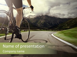 A Person Riding A Bike On A Road With Mountains In The Background PowerPoint Template