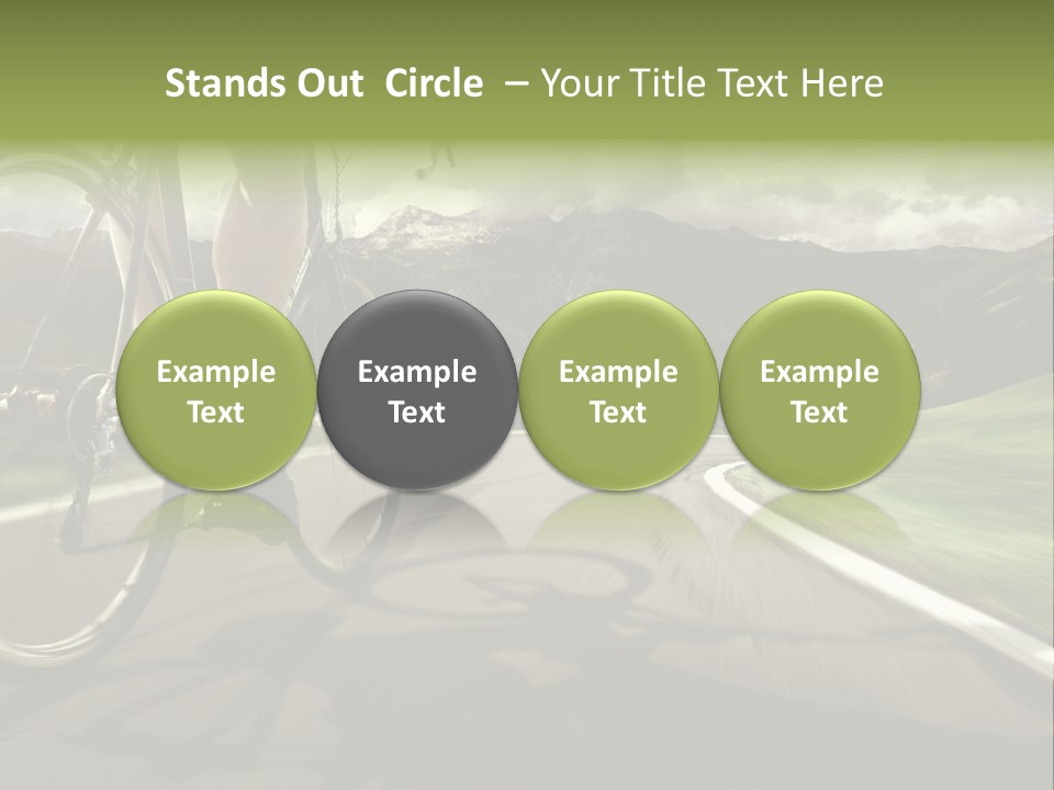 A Person Riding A Bike On A Road With Mountains In The Background PowerPoint Template