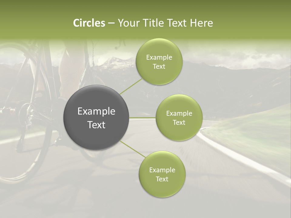 A Person Riding A Bike On A Road With Mountains In The Background PowerPoint Template