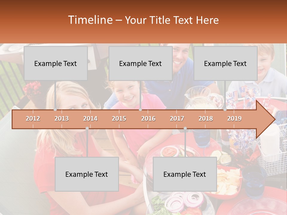 A Group Of People Sitting Around A Table With Food PowerPoint Template