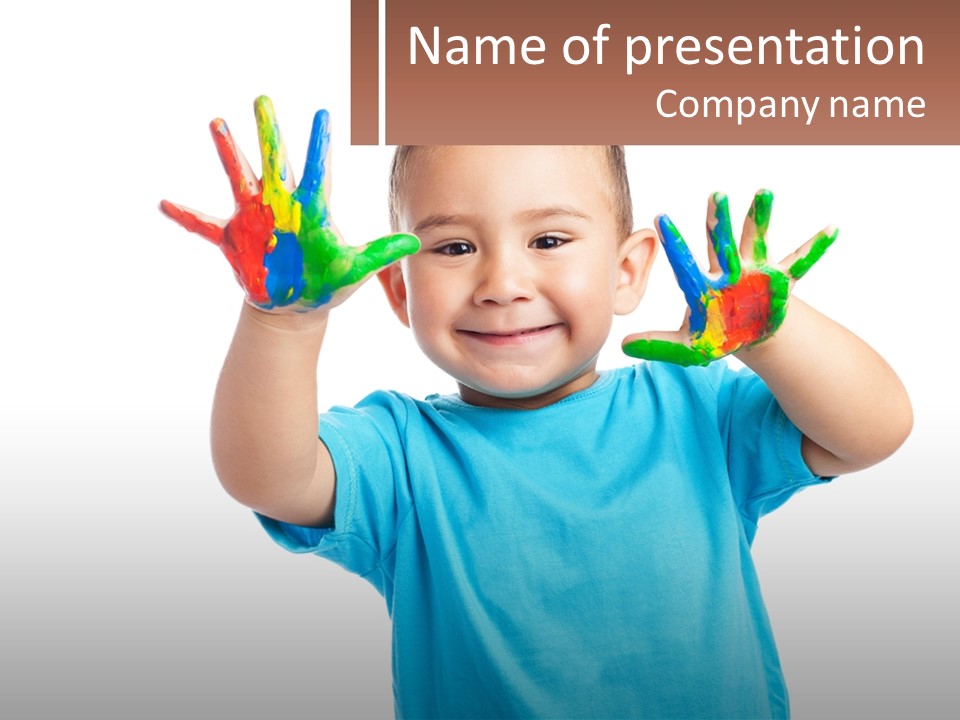 A Young Boy Is Holding His Hands Up To The Camera PowerPoint Template