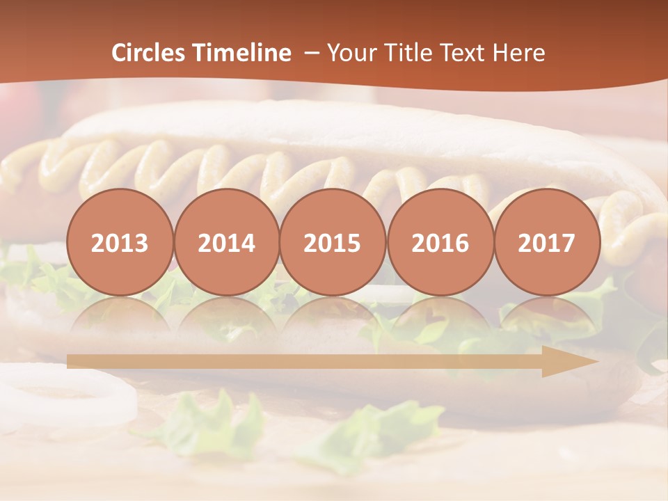 A Hot Dog With Mustard And Lettuce On A Bun PowerPoint Template