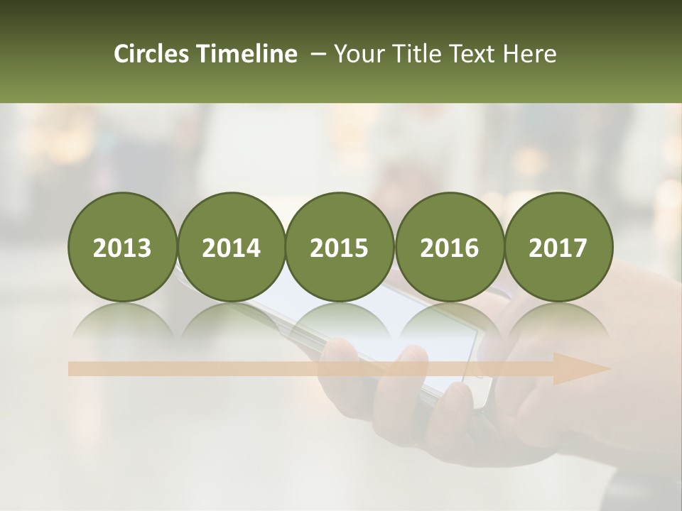 A Person Holding A Cell Phone In Their Hand PowerPoint Template