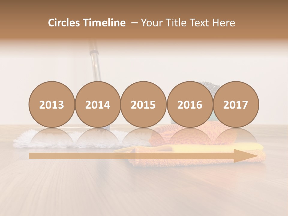 A Mop And Cleaning Supplies On A Wooden Floor PowerPoint Template