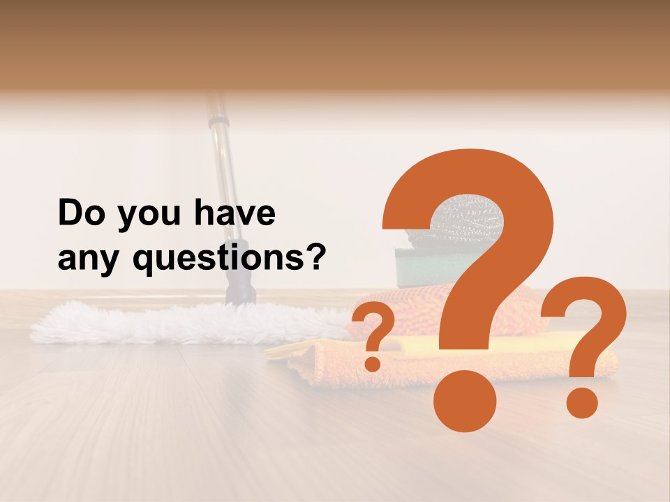 A Mop And Cleaning Supplies On A Wooden Floor PowerPoint Template