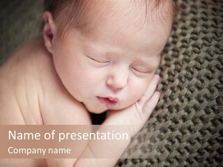 A Baby Is Laying Down On A Blanket PowerPoint Template