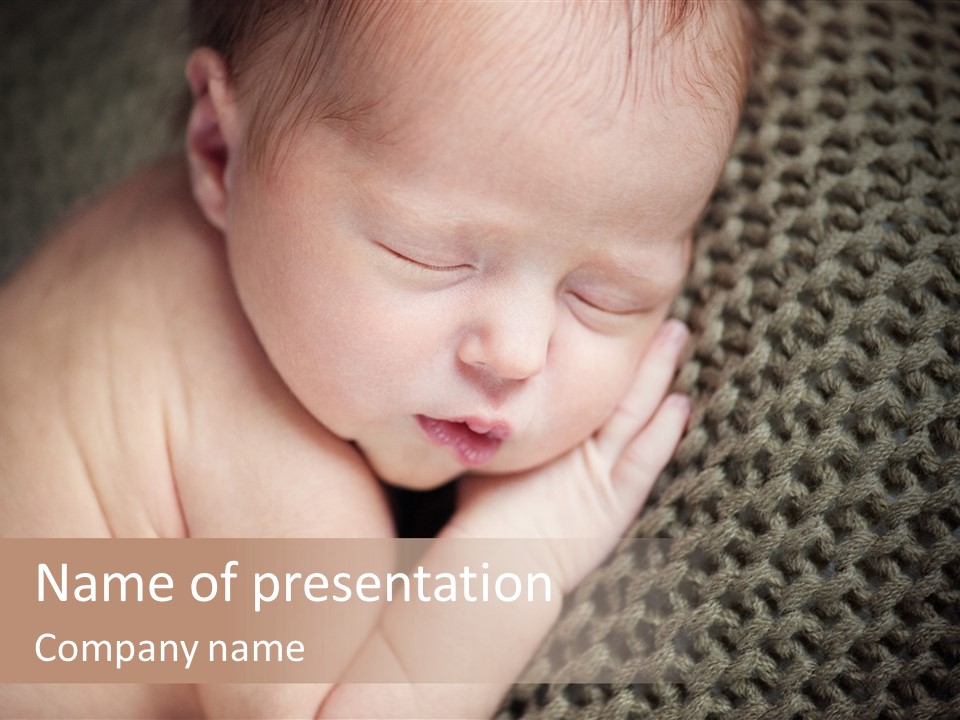A Baby Is Laying Down On A Blanket PowerPoint Template