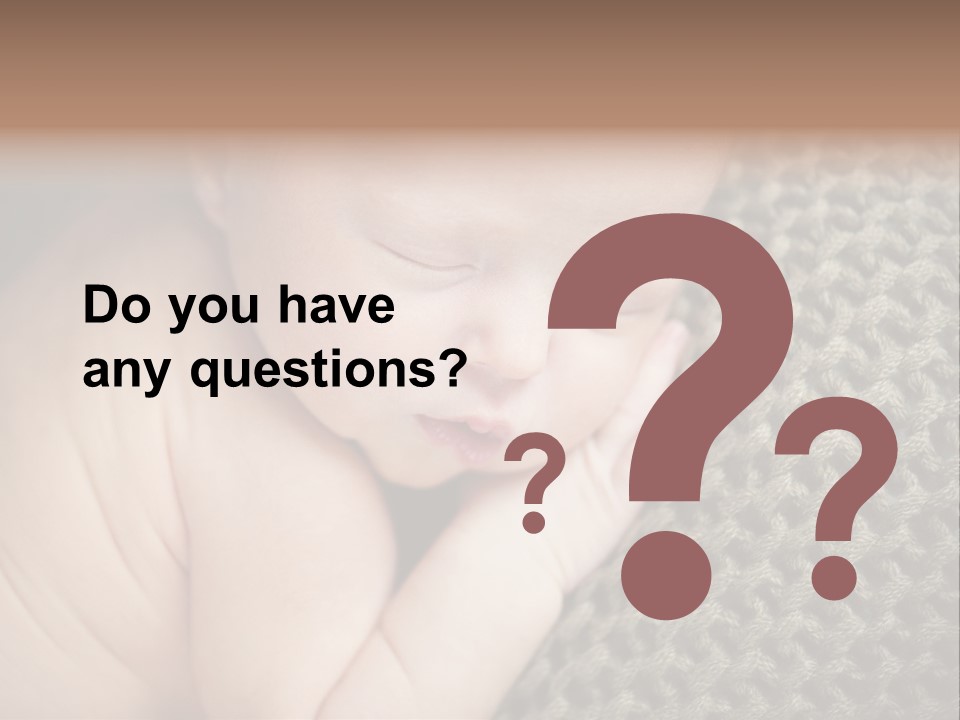 A Baby Is Laying Down On A Blanket PowerPoint Template