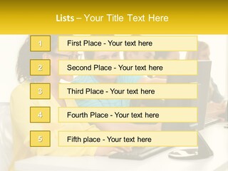 A Group Of People Sitting Around A Computer PowerPoint Template