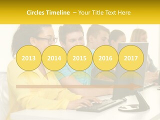 A Group Of People Sitting Around A Computer PowerPoint Template