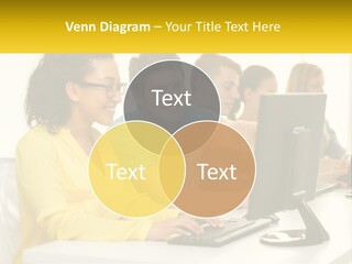 A Group Of People Sitting Around A Computer PowerPoint Template