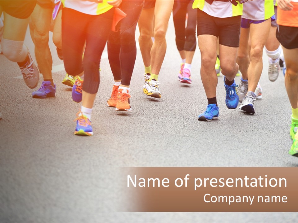 A Group Of People Running In A Marathon PowerPoint Template