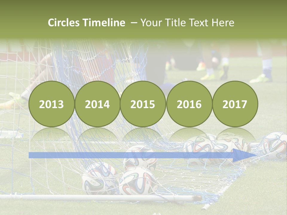 A Group Of Soccer Players Sitting On A Field PowerPoint Template