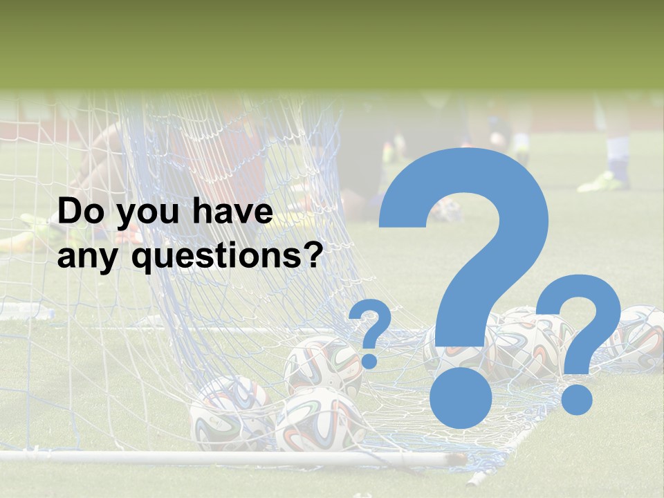 A Group Of Soccer Players Sitting On A Field PowerPoint Template