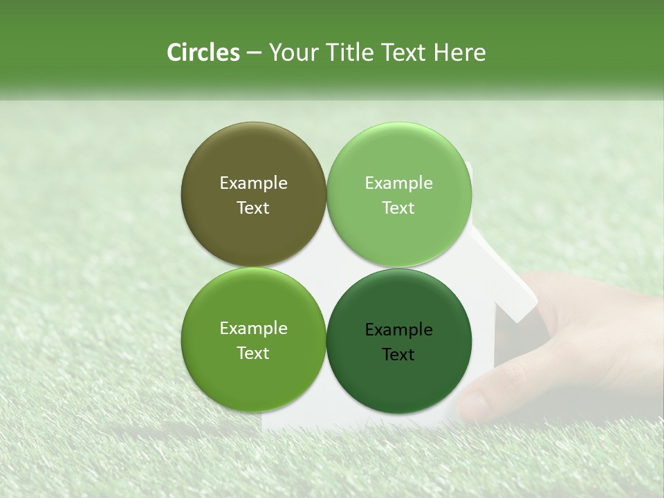 A Person Holding A Paper House In Their Hand PowerPoint Template