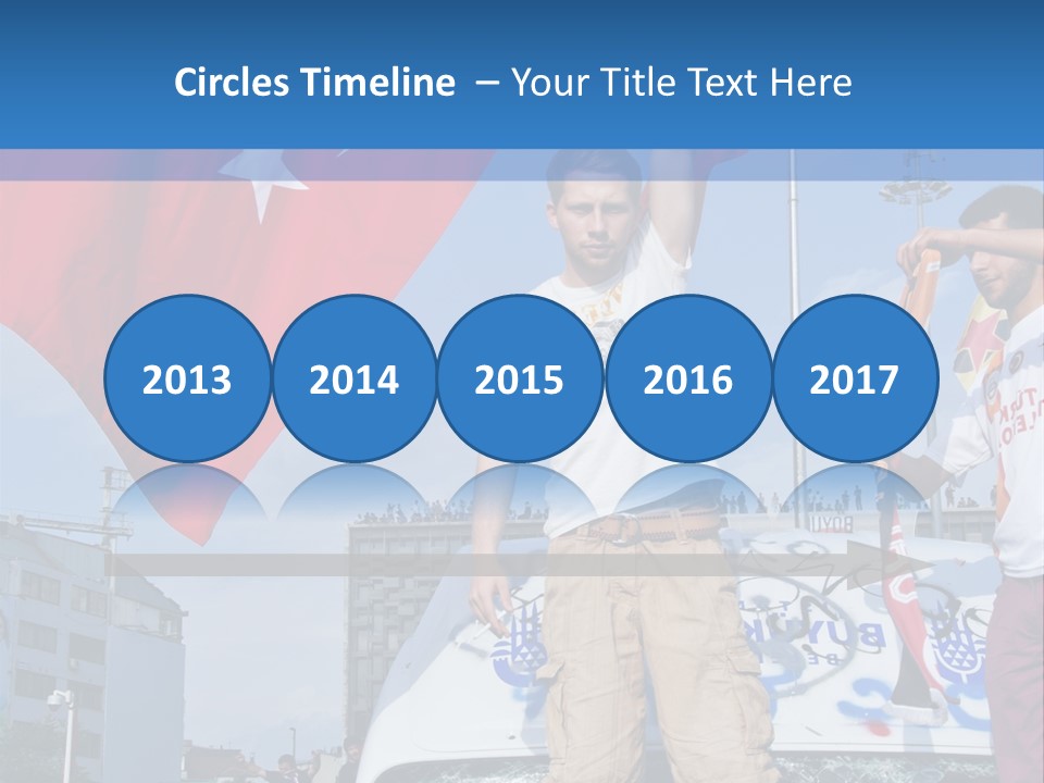 A Man Holding A Flag Standing On Top Of A Car PowerPoint Template