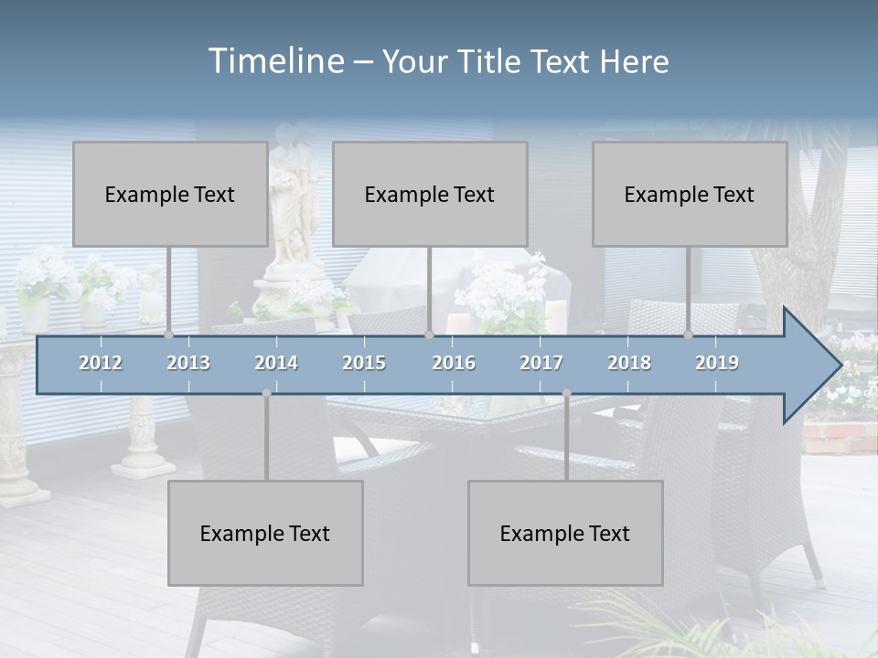 A Table And Chairs On A Patio With A Statue In The Background PowerPoint Template