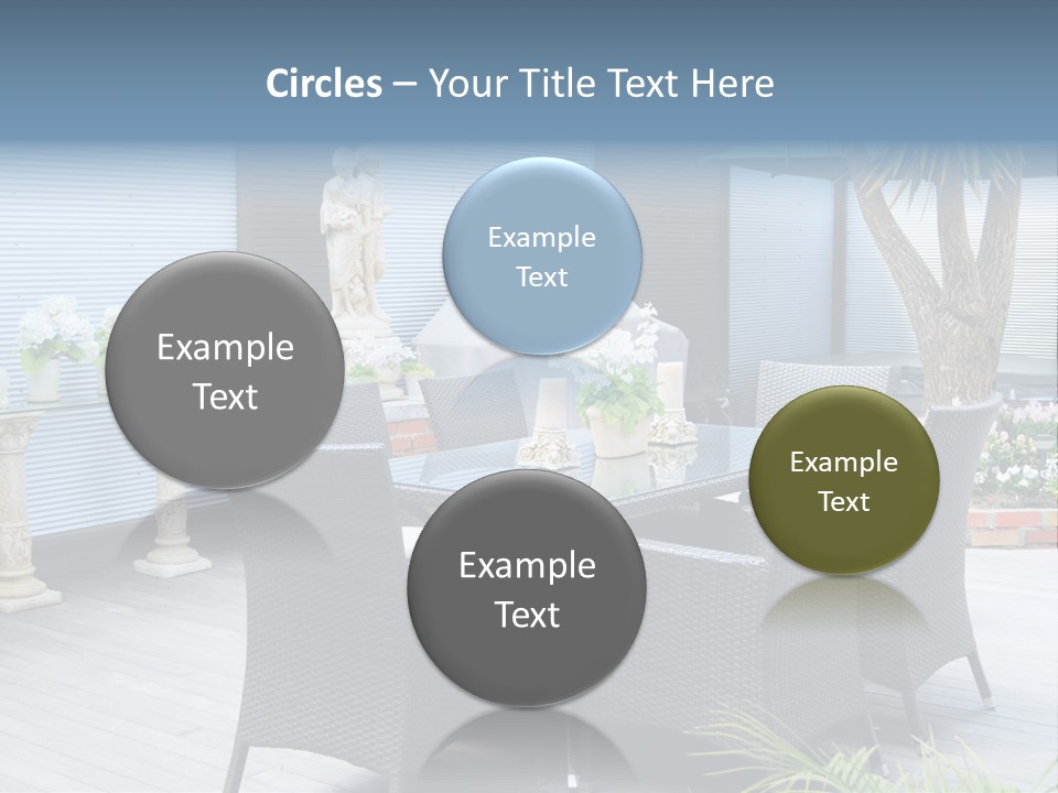 A Table And Chairs On A Patio With A Statue In The Background PowerPoint Template