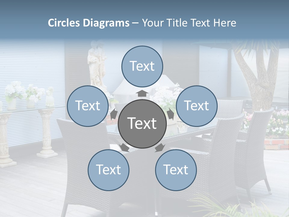 A Table And Chairs On A Patio With A Statue In The Background PowerPoint Template