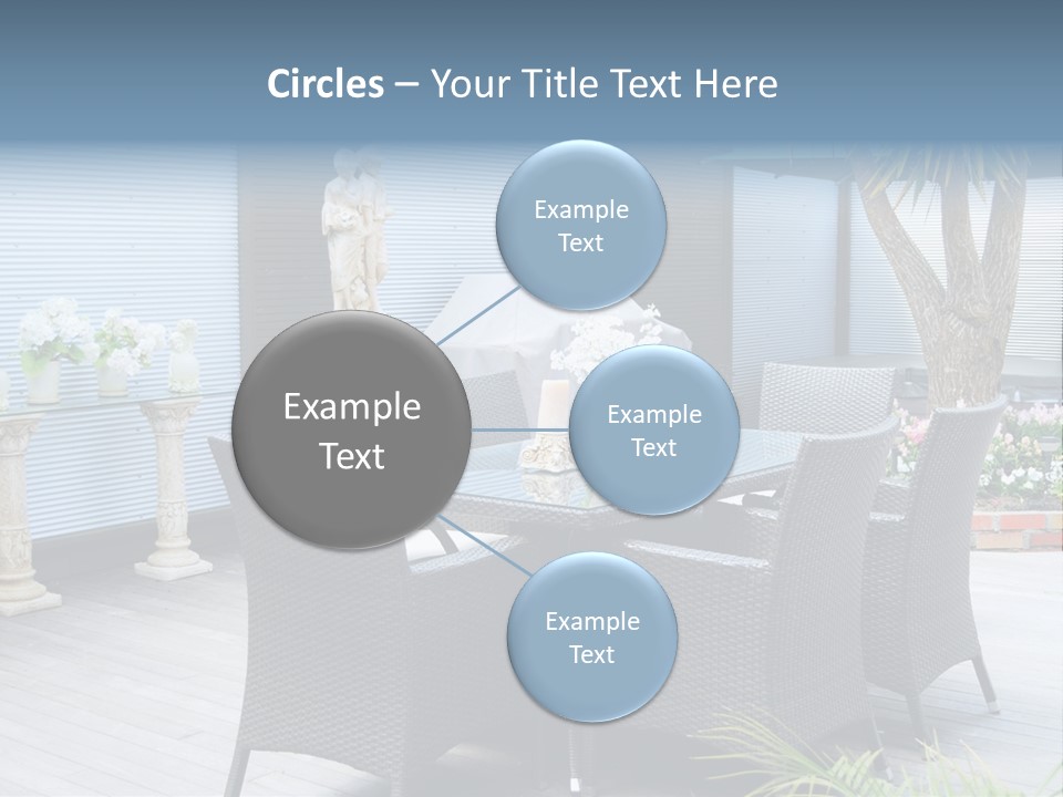 A Table And Chairs On A Patio With A Statue In The Background PowerPoint Template