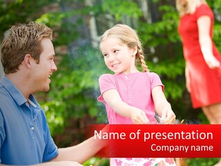 A Man And A Little Girl Sitting At A Table PowerPoint Template