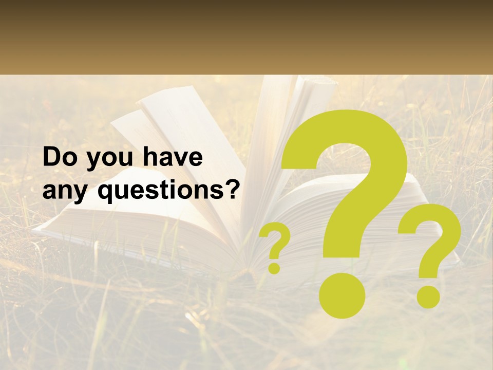 An Open Book Sitting On Top Of A Lush Green Field PowerPoint Template