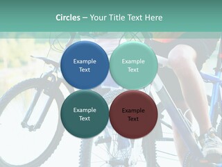 A Couple Of People Riding Bikes Next To Each Other PowerPoint Template
