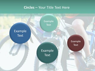 A Couple Of People Riding Bikes Next To Each Other PowerPoint Template