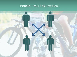 A Couple Of People Riding Bikes Next To Each Other PowerPoint Template