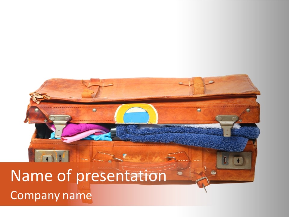 A Piece Of Luggage With A Towel And Other Items In It PowerPoint Template