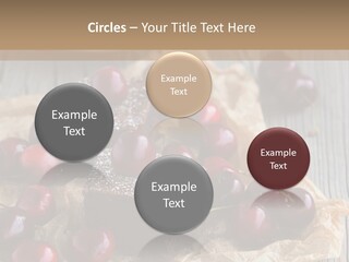 A Piece Of Cake With Cherries And A Cup Of Tea On A Wooden Table PowerPoint Template