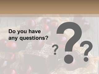 A Piece Of Cake With Cherries And A Cup Of Tea On A Wooden Table PowerPoint Template