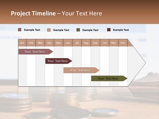A Pile Of Coins Sitting On Top Of A Wooden Table PowerPoint Template