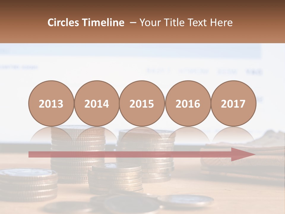 A Pile Of Coins Sitting On Top Of A Wooden Table PowerPoint Template