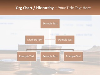 A Pile Of Coins Sitting On Top Of A Wooden Table PowerPoint Template